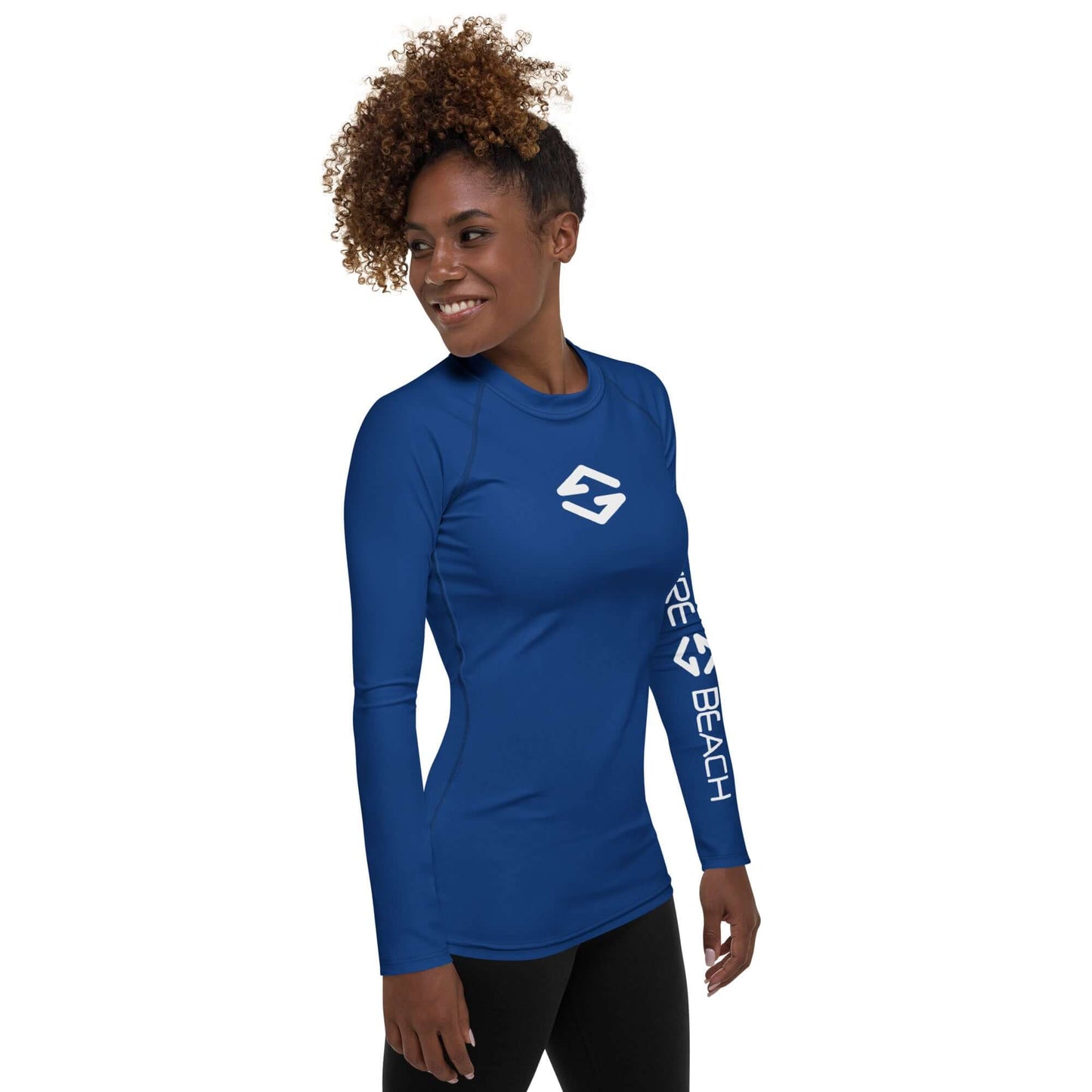Back view of a woman wearing Women's Rash Guard in Signature Blue with long sleeves. side view 2