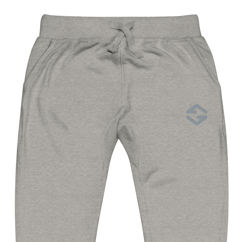 Unisex fleece sweatpants in black with soft fabric, elastic waistband, and relaxed fit light gray close up