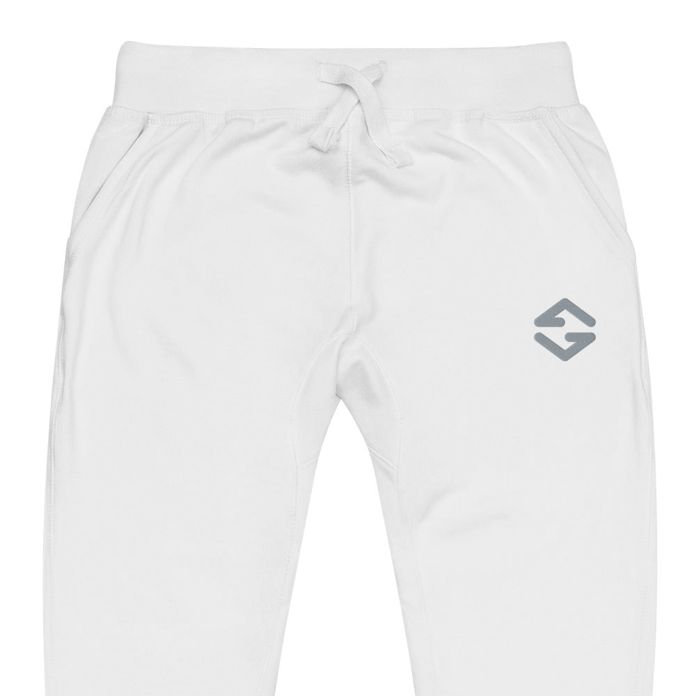 Unisex fleece sweatpants in black with soft fabric, elastic waistband, and relaxed fit white close up