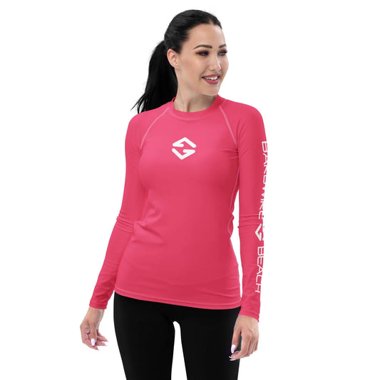 Women's Rash Guard in vibrant pink with long sleeves and logo, ideal for outdoor activities and sun protection.